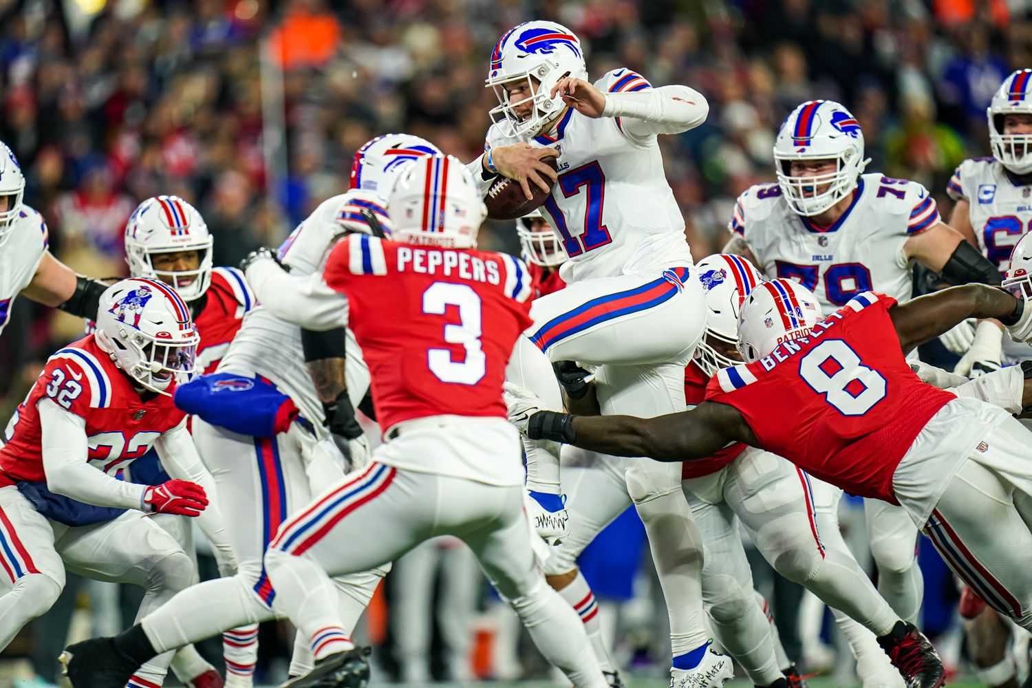 Dec 1, 2022; Foxborough, Massachusetts, USA; Buffalo Bills quarterback Josh Allen (17) runs the ball against the New England Patriots in the first quarter at Gillette Stadium.